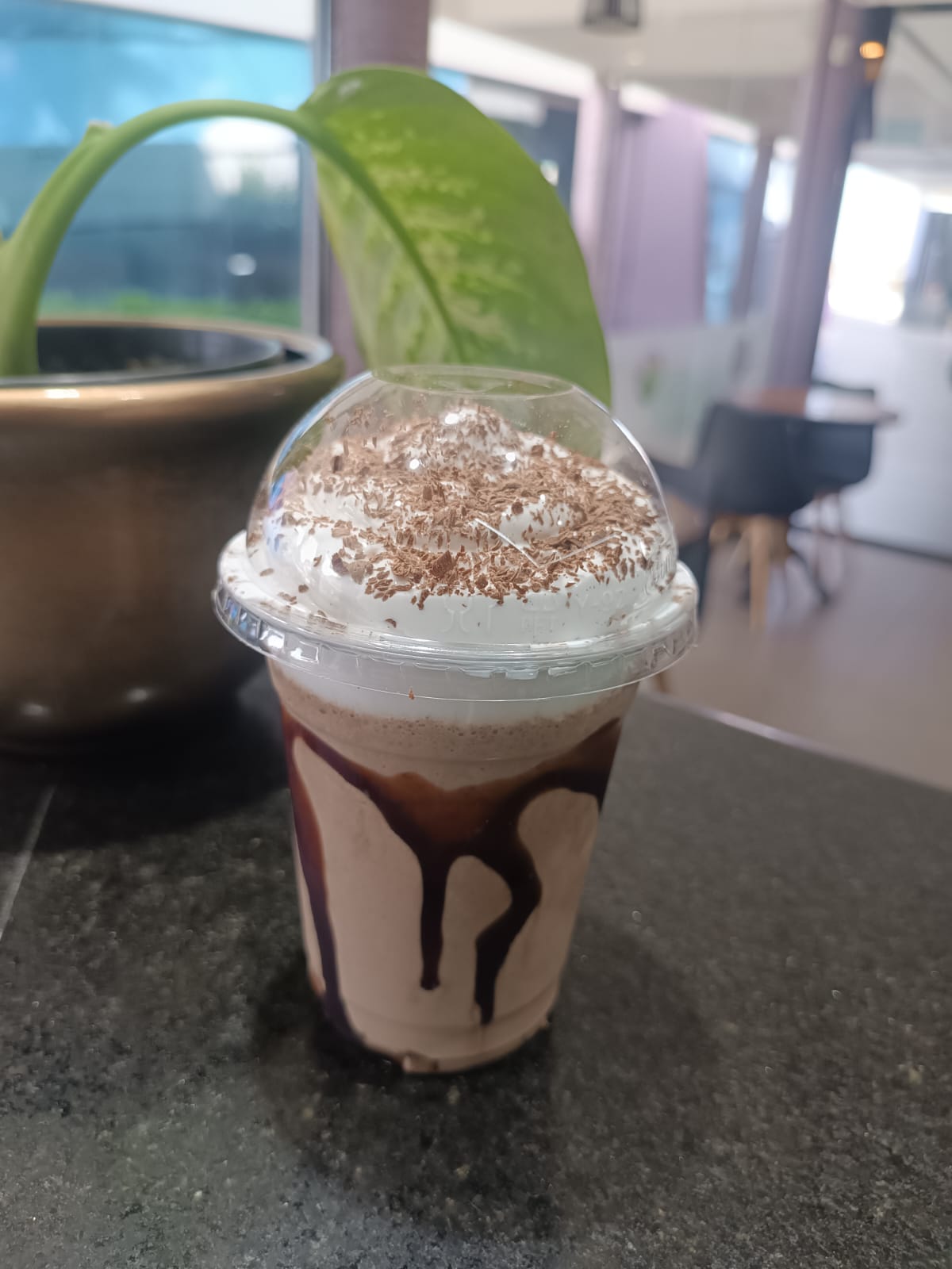 Bebida servida na Ráfia Coffee